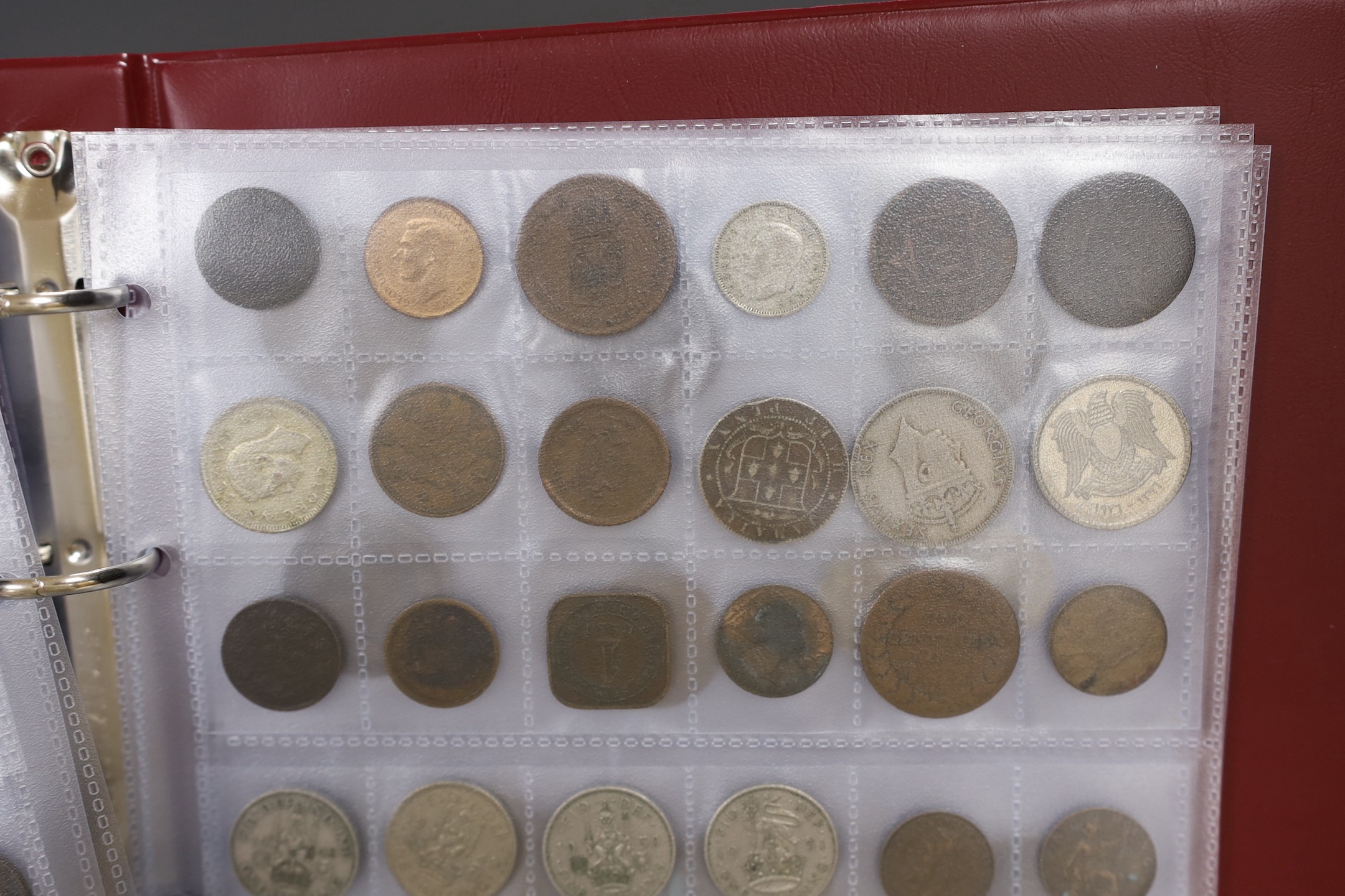 An album of British, Commonwealth and world coins including